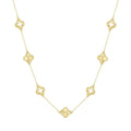 Clover Pendant Necklace in 14K gold-plated 925 silver with alternating open and sunburst clover stations, on white