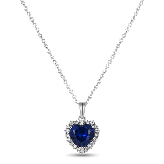 Blue CZ Heart Necklace in rhodium-plated 925 silver: a heart-cut blue AAAAA cubic zirconia framed by white stones, on a fine chain