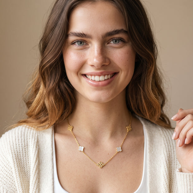 Model wearing the Clover Shell Pearl Necklace in 14K gold-plated 925 sterling silver