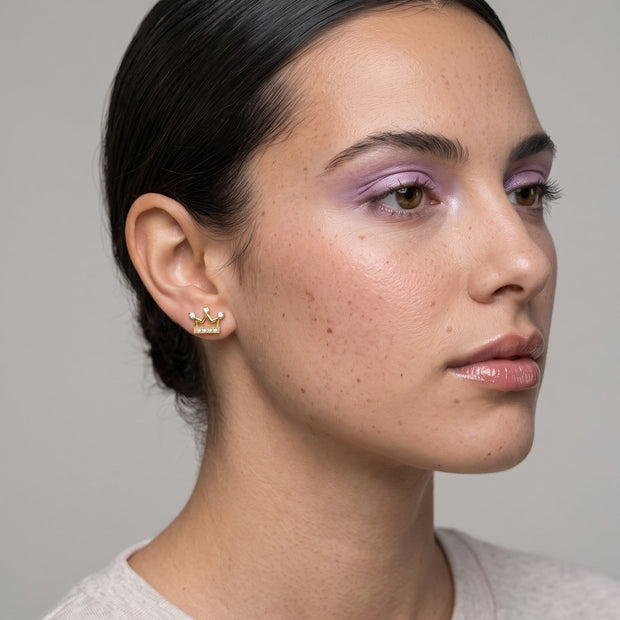 Model wearing the 14K gold-plated crown CZ stud earring, 6 x 8 mm